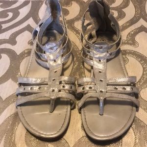 Kids 5 (approx woman’s 7-7.5) silver sandals.